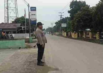 Polsek Bosar Maligas Wujudkan Pelayanan Humanis Melalui Pengaturan Lalu Lintas di Pagi Hari