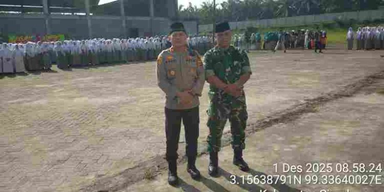 Polsek Perdagangan Sebagai Inspektur Upacara Milad Ke – 95 Al Washliyah di Kecamatan Bandar